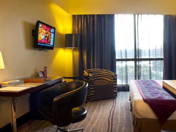 Ming Garden Hotel & Residences : photo 4 de la chambre chambre lit king-size deluxe