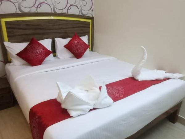 Hotel Amulya Relax Inn : photo 4 de la chambre chambre supérieure lit queen-size