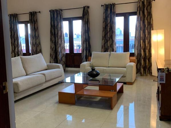 Cinco de Mayo Hotel : photo 5 de la chambre suite lit king-size avec balcon