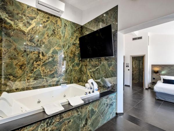 Hotel POZZO DI BORGO : photo 5 de la chambre chambre double deluxe