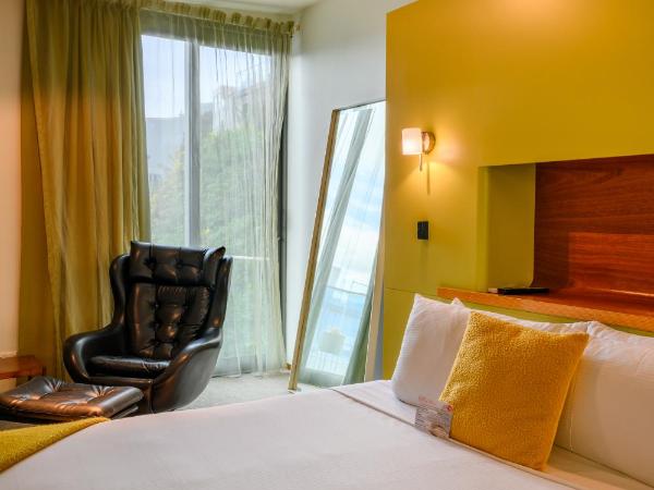 Ohtel Wellington : photo 7 de la chambre chambre lit king-size de luxe avec baignoire