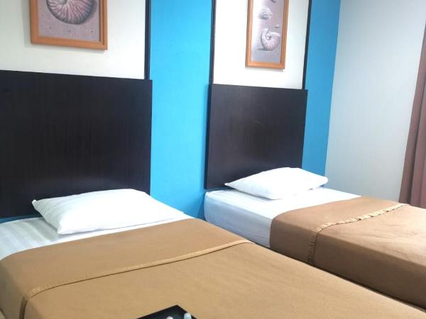 Shangg INN : photo 3 de la chambre chambre lits jumeaux deluxe