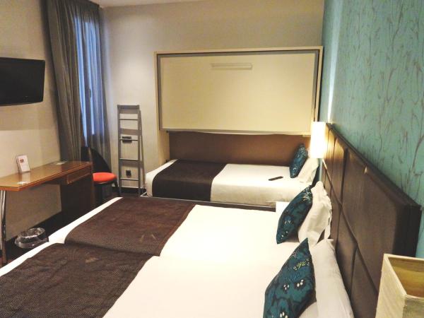 Hotel Lloret Ramblas : photo 1 de la chambre chambre quadruple classique