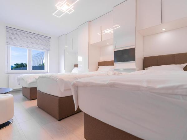 Arena Rooms Zagreb : photo 1 de la chambre chambre triple deluxe