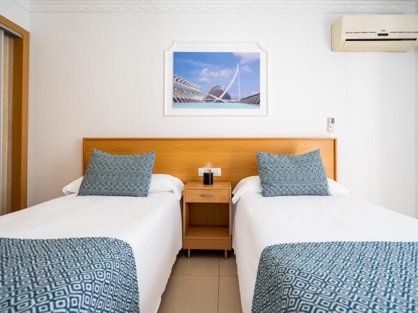 Hostal RR Feria by Beleret : photo 3 de la chambre chambre double ou lits jumeaux