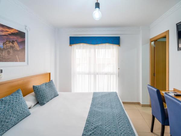 Hostal RR Feria by Beleret : photo 2 de la chambre chambre double ou lits jumeaux