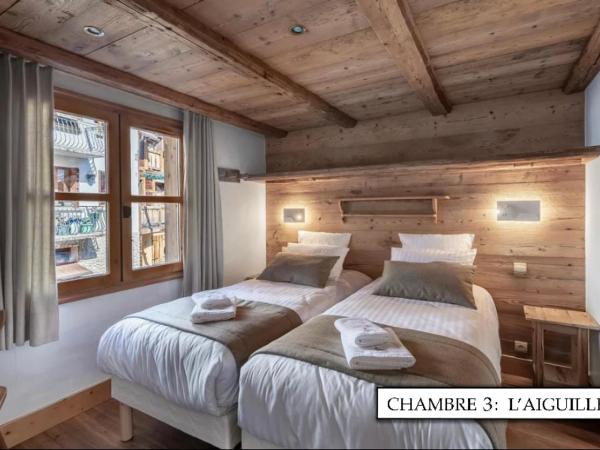 Chalet K120 - Village du Praz - Courchevel : photo 1 de la chambre chambre double ou lits jumeaux
