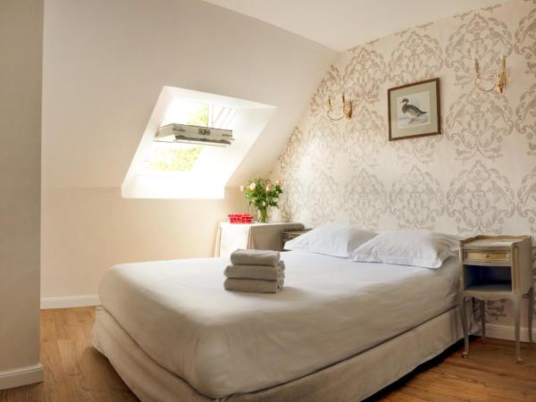 Hôtel De France Et De Guise - 1891 : photo 1 de la chambre chambre double sous le toit