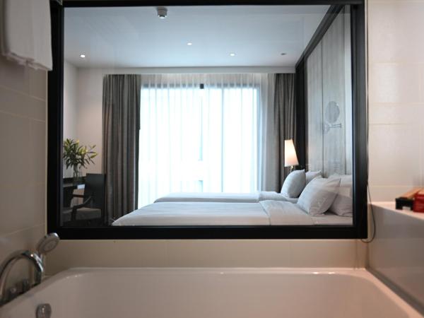 Mövenpick Hotel Sukhumvit 15 Bangkok : photo 1 de la chambre chambre lits jumeaux deluxe