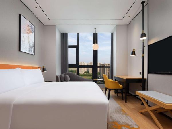 Hilton Garden Inn Hangzhou Xiaoshan : photo 1 de la chambre chambre lit king-size