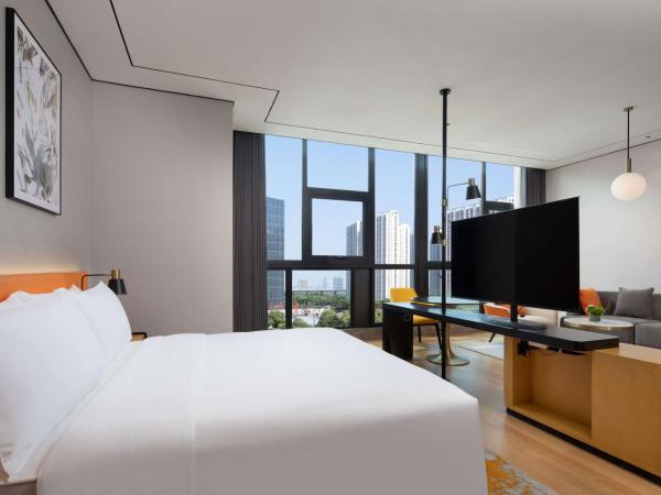 Hilton Garden Inn Hangzhou Xiaoshan : photo 1 de la chambre chambre lit king-size deluxe