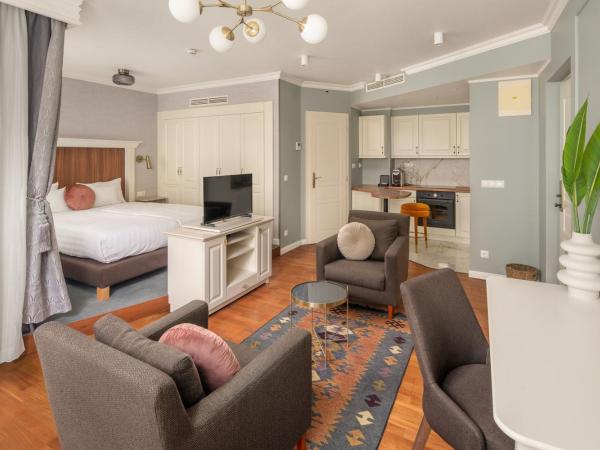 Queen's Court Hotel & Residence : photo 4 de la chambre suite junior