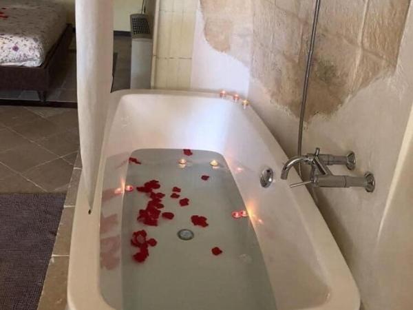 Alla dimora di Chiara Suite and Rooms : photo 2 de la chambre suite junior - vue sur jardin