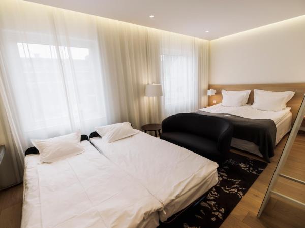 PM & Vänner Hotel : photo 1 de la chambre chambre triple