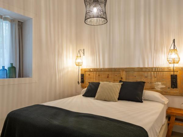 Hostal Boutique Es Menut : photo 8 de la chambre chambre quadruple avec balcon 