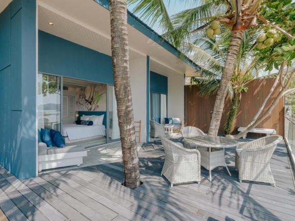 Hotel Tide Phuket Beach Front : photo 5 de la chambre hébergement deluxe - vue sur océan (réservé aux adultes)