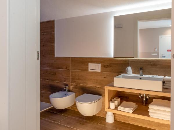 M14 RESIDENZA BASSANELLO : photo 2 de la chambre chambre familiale avec salle de bains privative