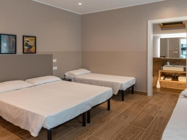 M14 RESIDENZA BASSANELLO : photo 4 de la chambre chambre familiale avec salle de bains privative