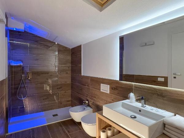 M14 RESIDENZA BASSANELLO : photo 6 de la chambre chambre familiale avec salle de bains privative