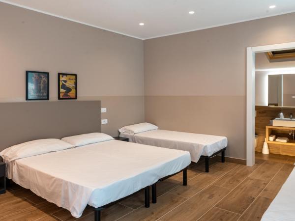 M14 RESIDENZA BASSANELLO : photo 7 de la chambre chambre familiale avec salle de bains privative