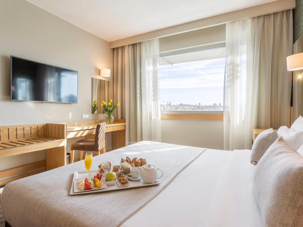 HF Ipanema Porto : photo 1 de la chambre hébergement lit king-size confort