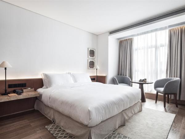 David's Deer Hotel : photo 1 de la chambre chambre lit queen-size