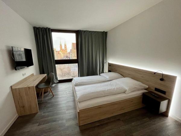 NB Apartments : photo 1 de la chambre chambre double ou lits jumeaux deluxe - vue sur ville 