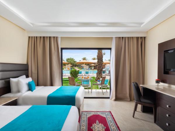 Pickalbatros Aqua Fun Club All inclusive : photo 1 de la chambre chambre lits jumeaux de luxe - vue sur piscine