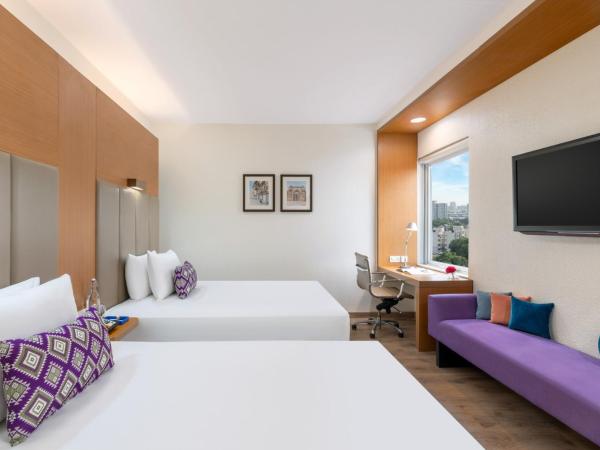 Vivanta Ahmedabad SG Highway : photo 3 de la chambre chambre de luxe lits jumeaux
