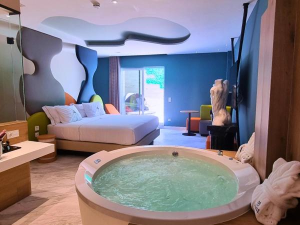 Hotel Avenue - Lovely hotel : photo 4 de la chambre suite deluxe avec baignoire spa