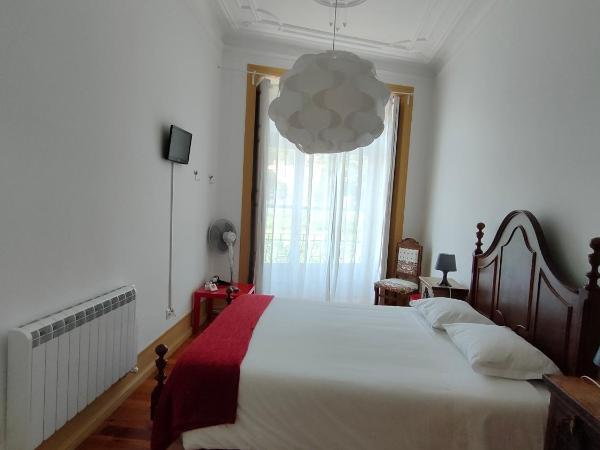 A Vianesa - Guest House : photo 3 de la chambre chambre double avec salle de bains commune