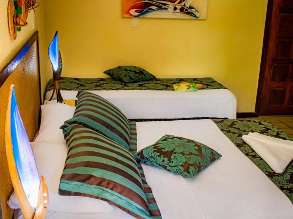 Castelo Beach Hotel : photo 3 de la chambre chambre triple de luxe avec vue latérale sur la mer