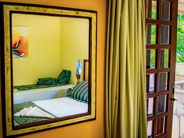 Castelo Beach Hotel : photo 4 de la chambre chambre triple de luxe avec vue latérale sur la mer