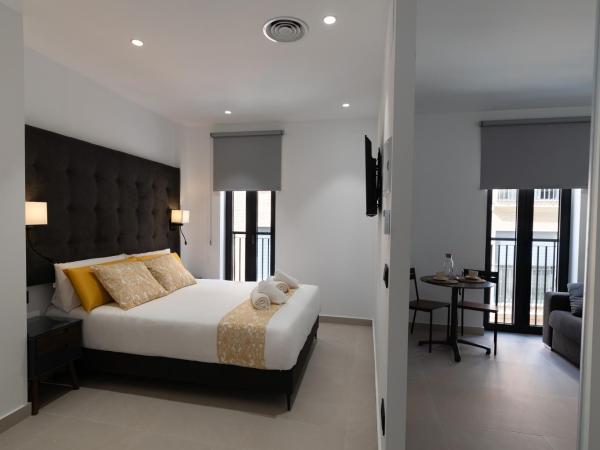 Suites Puerto Valencia : photo 3 de la chambre chambre double supérieure