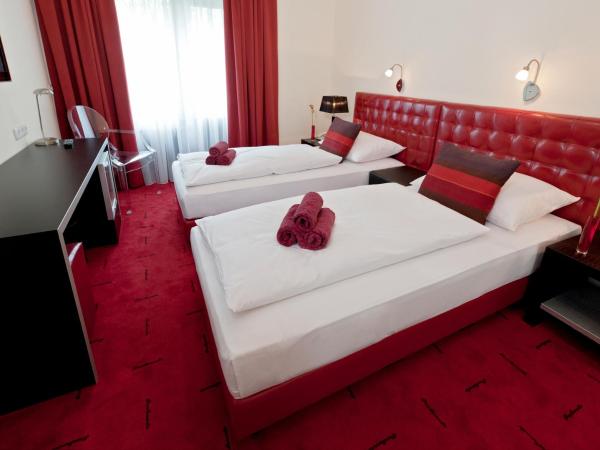 Hotel Esplanade : photo 1 de la chambre chambre lits jumeaux