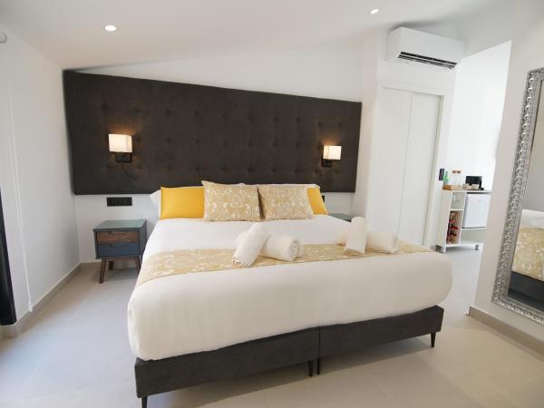 Suites Puerto Valencia : photo 6 de la chambre suite supérieure lit king-size