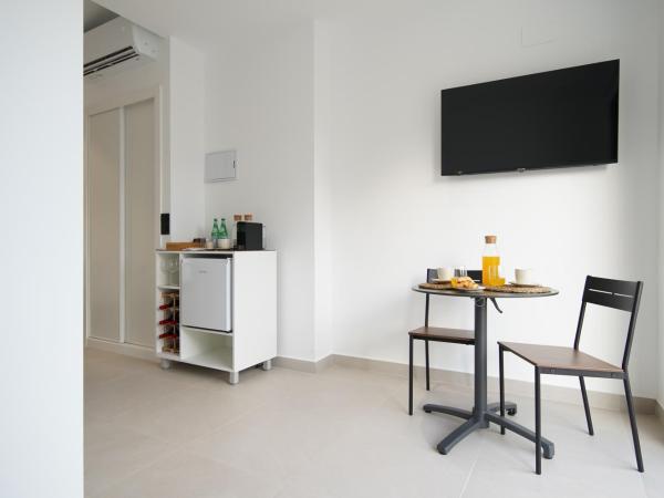 Suites Puerto Valencia : photo 7 de la chambre suite supérieure lit king-size