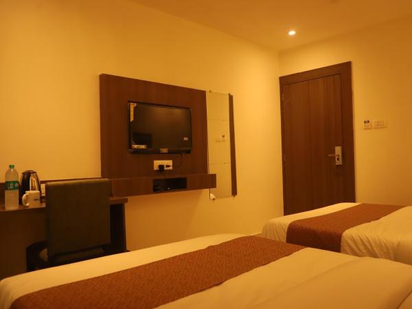 Hotel Sai Pritam : photo 6 de la chambre chambre quadruple avec salle de bains privative