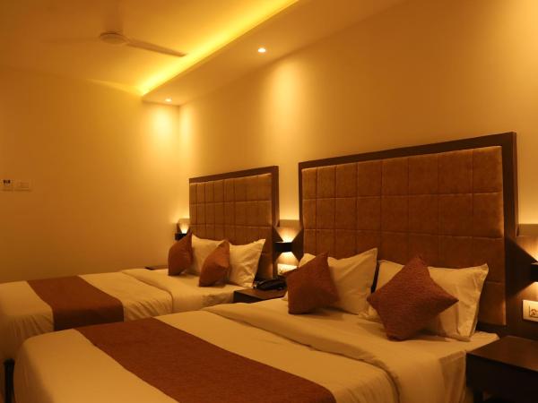 Hotel Sai Pritam : photo 4 de la chambre chambre quadruple avec salle de bains privative