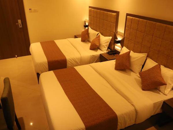 Hotel Sai Pritam : photo 7 de la chambre chambre quadruple avec salle de bains privative