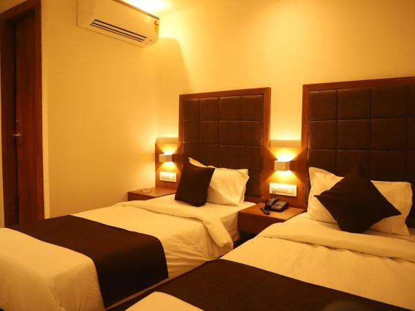 Hotel Sai Pritam : photo 8 de la chambre chambre lits jumeaux avec salle de bains privative