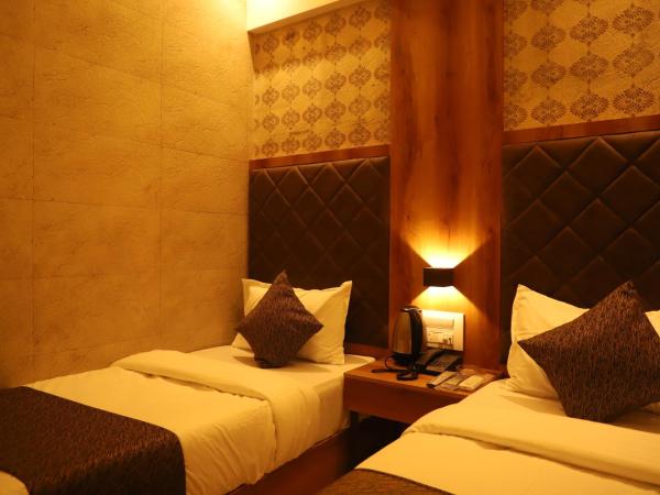Hotel Sai Pritam : photo 5 de la chambre chambre lits jumeaux avec salle de bains privative
