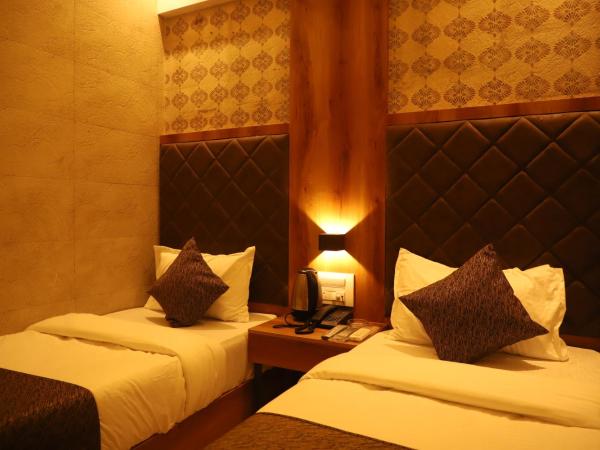 Hotel Sai Pritam : photo 4 de la chambre chambre lits jumeaux avec salle de bains privative