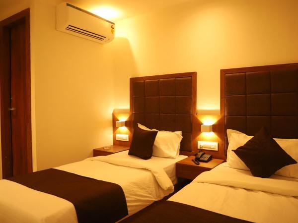 Hotel Sai Pritam : photo 9 de la chambre chambre lits jumeaux avec salle de bains privative