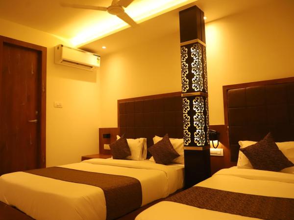 Hotel Sai Pritam : photo 5 de la chambre chambre triple avec salle de bains privative