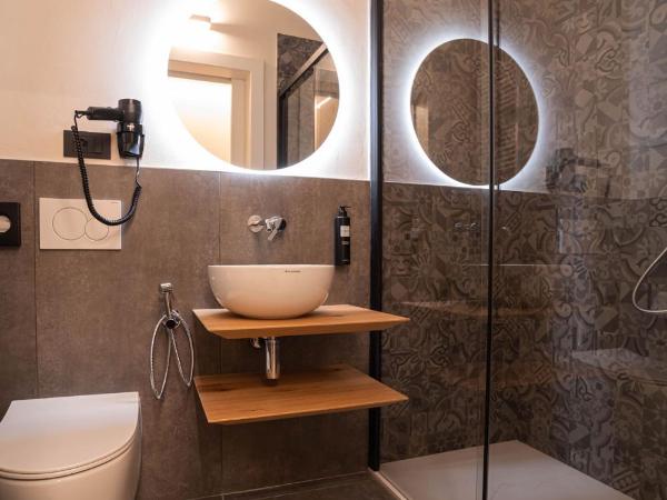 Calcirelli Suites : photo 4 de la chambre chambre familiale deluxe