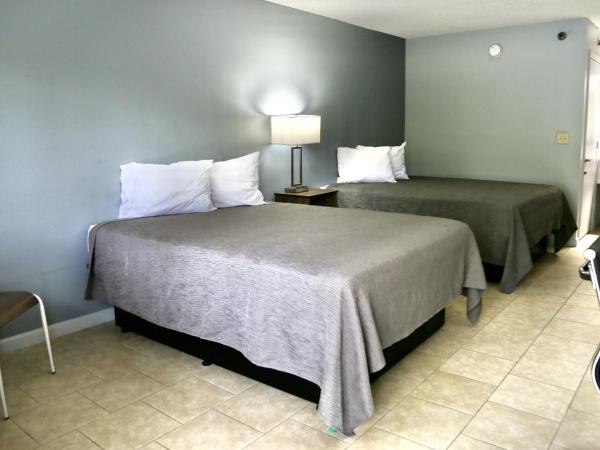 Home Inn & Suites : photo 1 de la chambre suite double standard