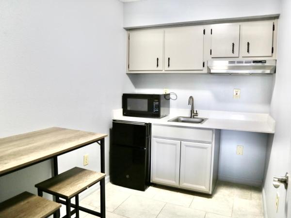 Home Inn & Suites : photo 2 de la chambre suite double standard