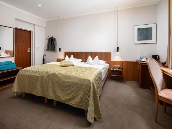 Hotel Baseler Hof : photo 1 de la chambre chambre familiale