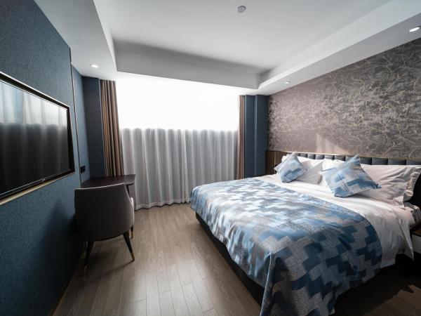 Dijing Hotel Shanghai : photo 4 de la chambre elegant business double room